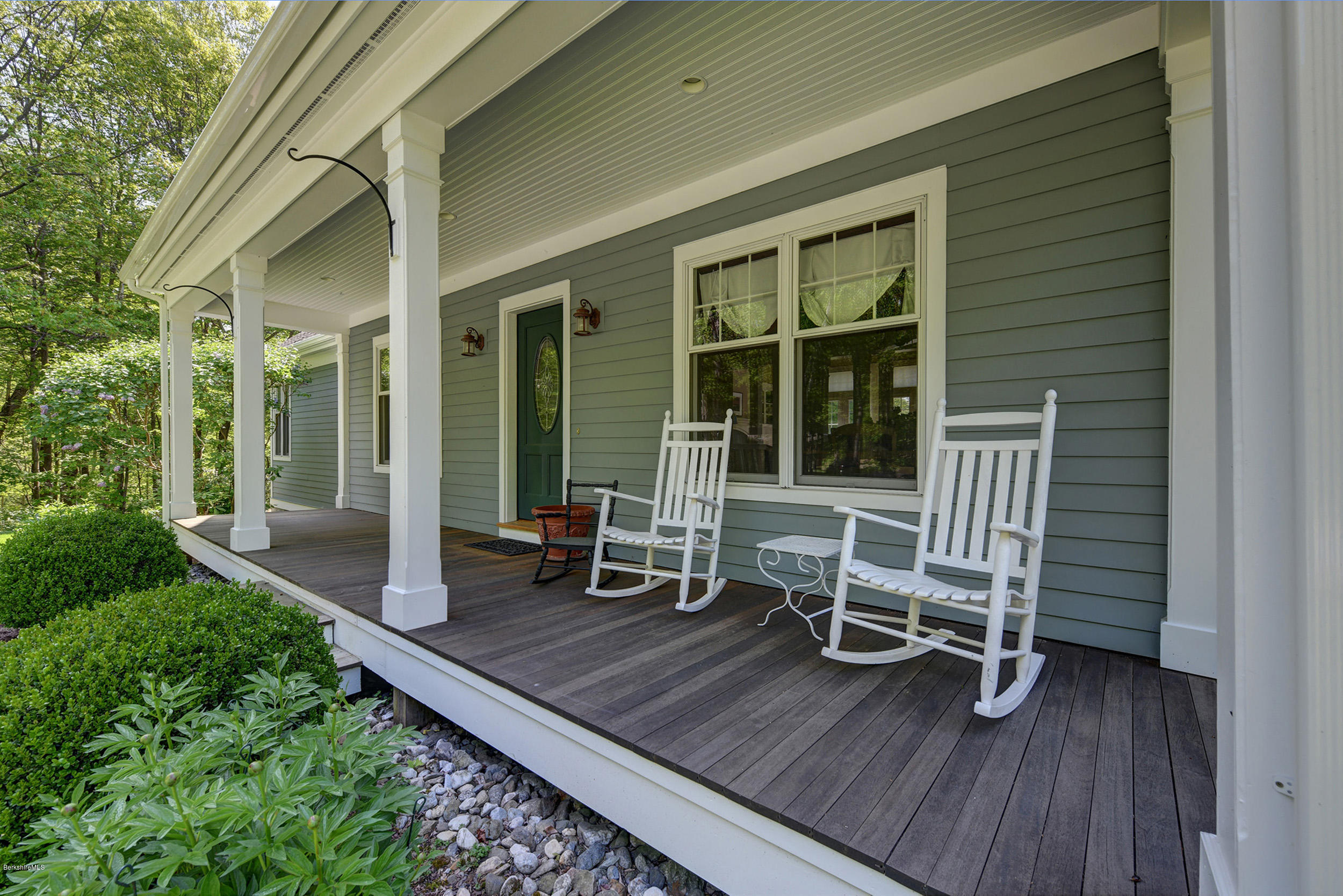 28 Austerlitz Road West Stockbridge, MA 01266 - Photo 42 of 44 a wooden bench sitting in front of a house