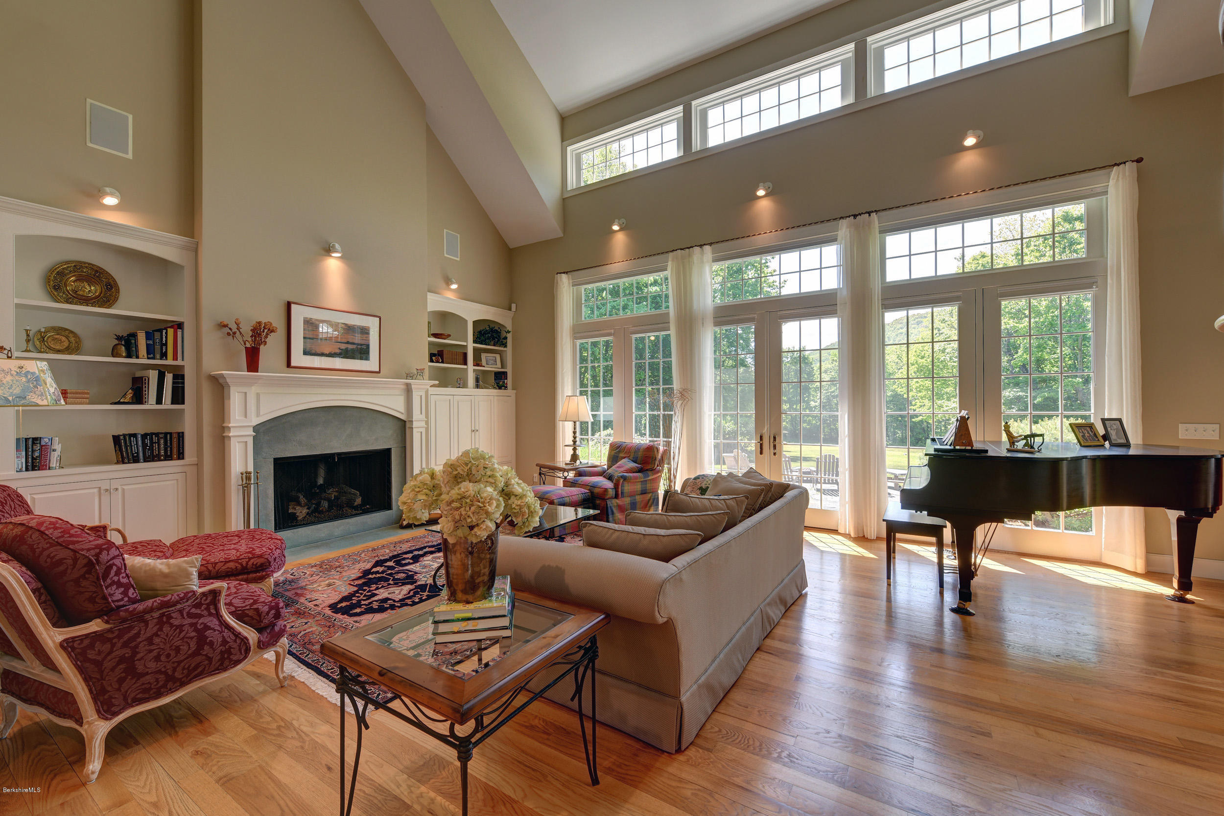 28 Austerlitz Road West Stockbridge, MA 01266 - Photo 8 of 44 a living room with furniture fireplace and a large window