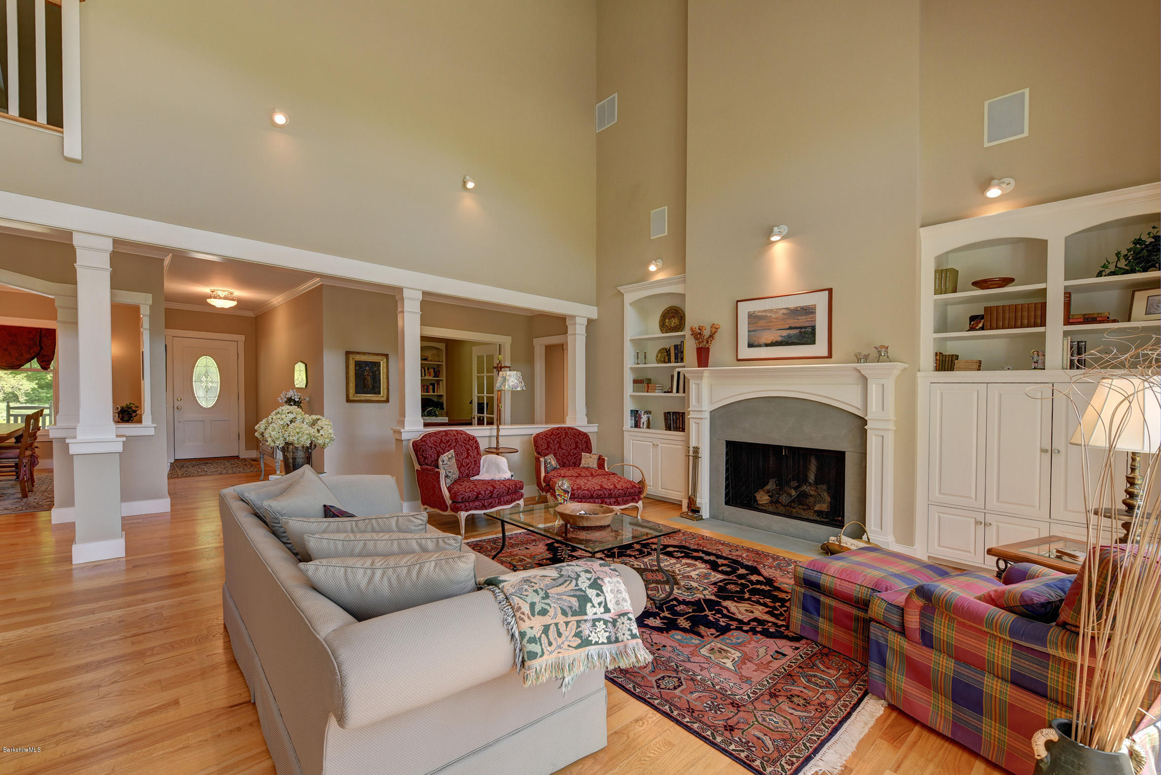 28 Austerlitz Road West Stockbridge, MA 01266 - Photo 10 of 44 a living room with furniture fireplace and wooden floor