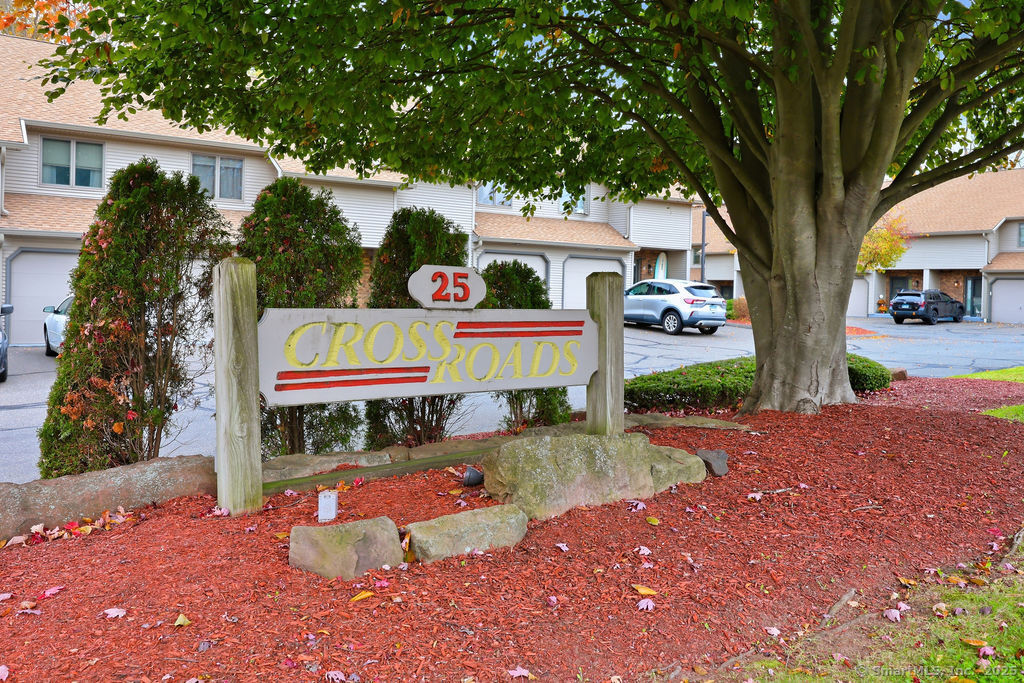 25 Washington Street, Unit 20 Bristol, CT 06010 - Photo 3 of 29 a sign that is sitting in front of a house