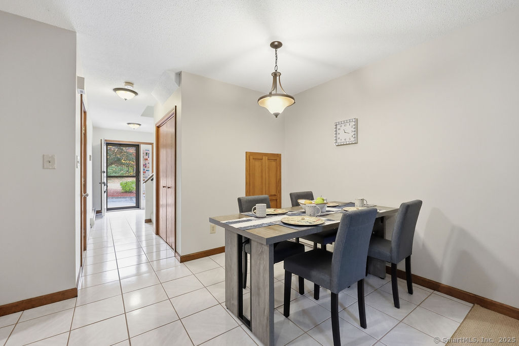 25 Washington Street, Unit 20 Bristol, CT 06010 - Photo 7 of 29 a view of a dining room with furniture