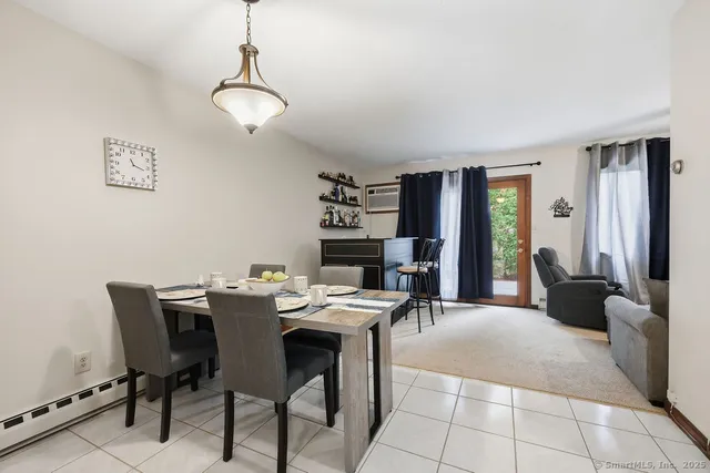 a kitchen with stainless steel appliances granite countertop a sink and a stove