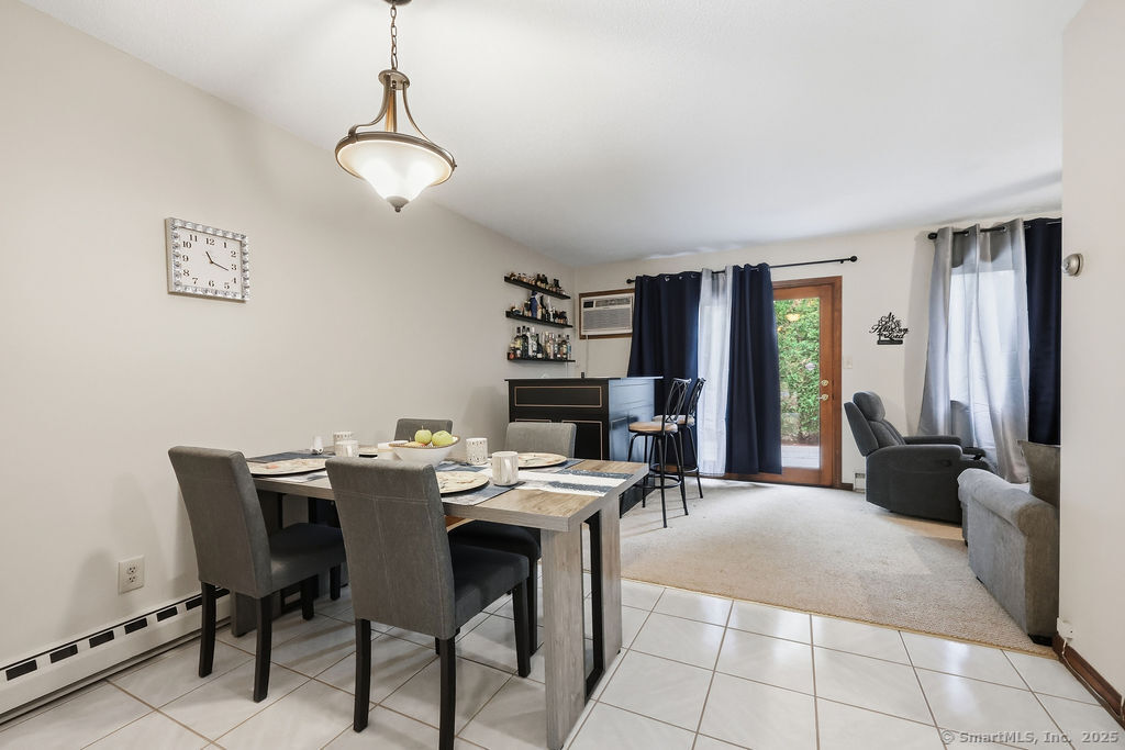 25 Washington Street, Unit 20 Bristol, CT 06010 - Photo 8 of 29 a view of a dining room with furniture