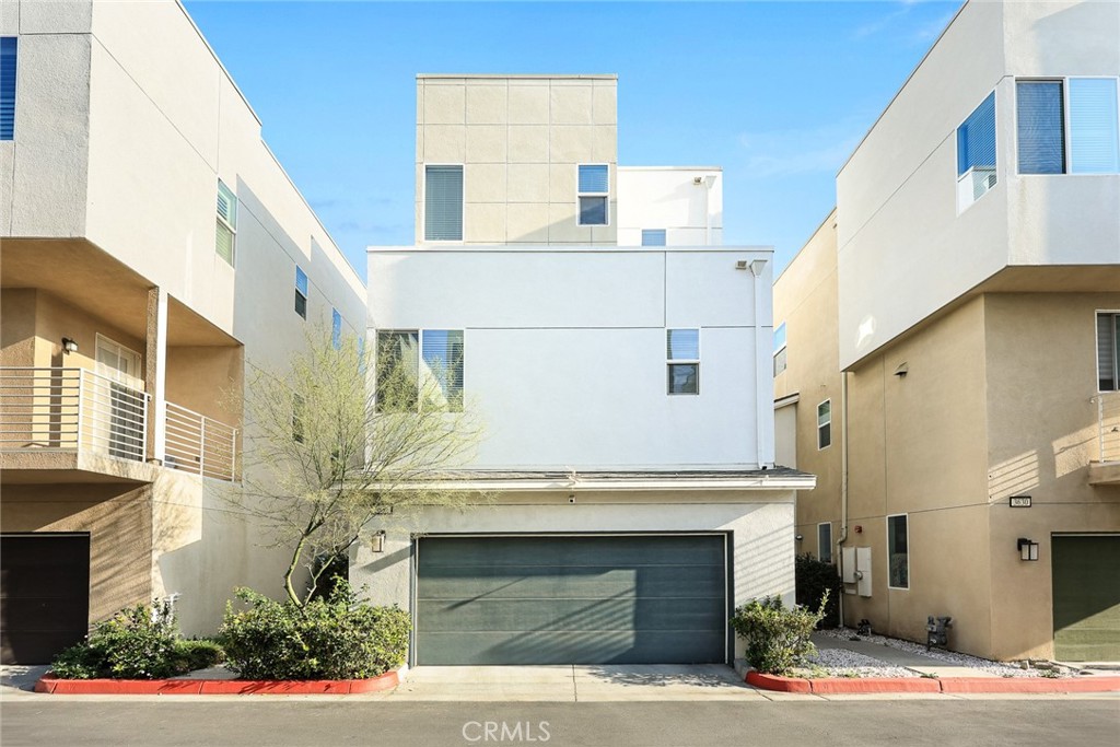 3632 Jackson Baldwin Park, CA 91706 - Photo 1 of 24 a front view of a building with a garden and plants