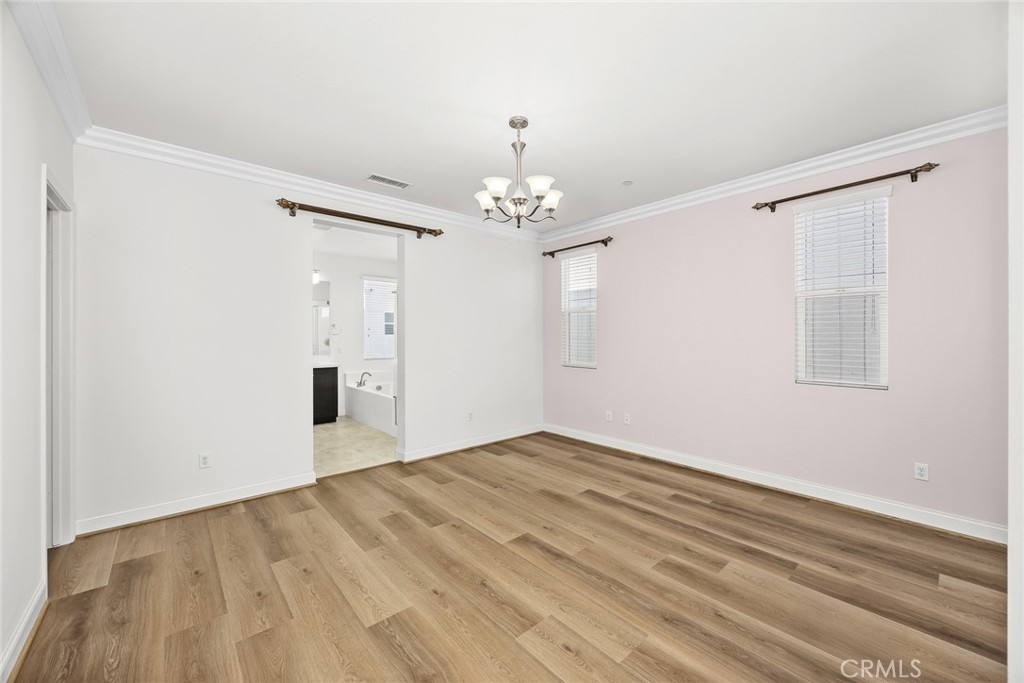 3632 Jackson Baldwin Park, CA 91706 - Photo 19 of 24 wooden floor in an empty room with a window