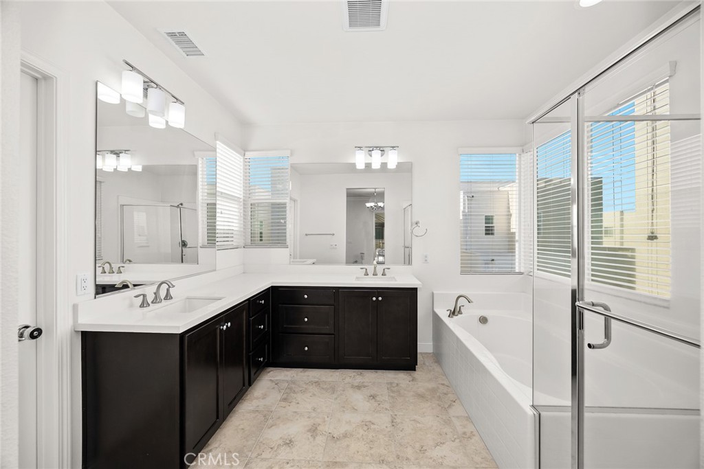 3632 Jackson Baldwin Park, CA 91706 - Photo 21 of 24 a spacious bathroom with a tub sink shower and mirror