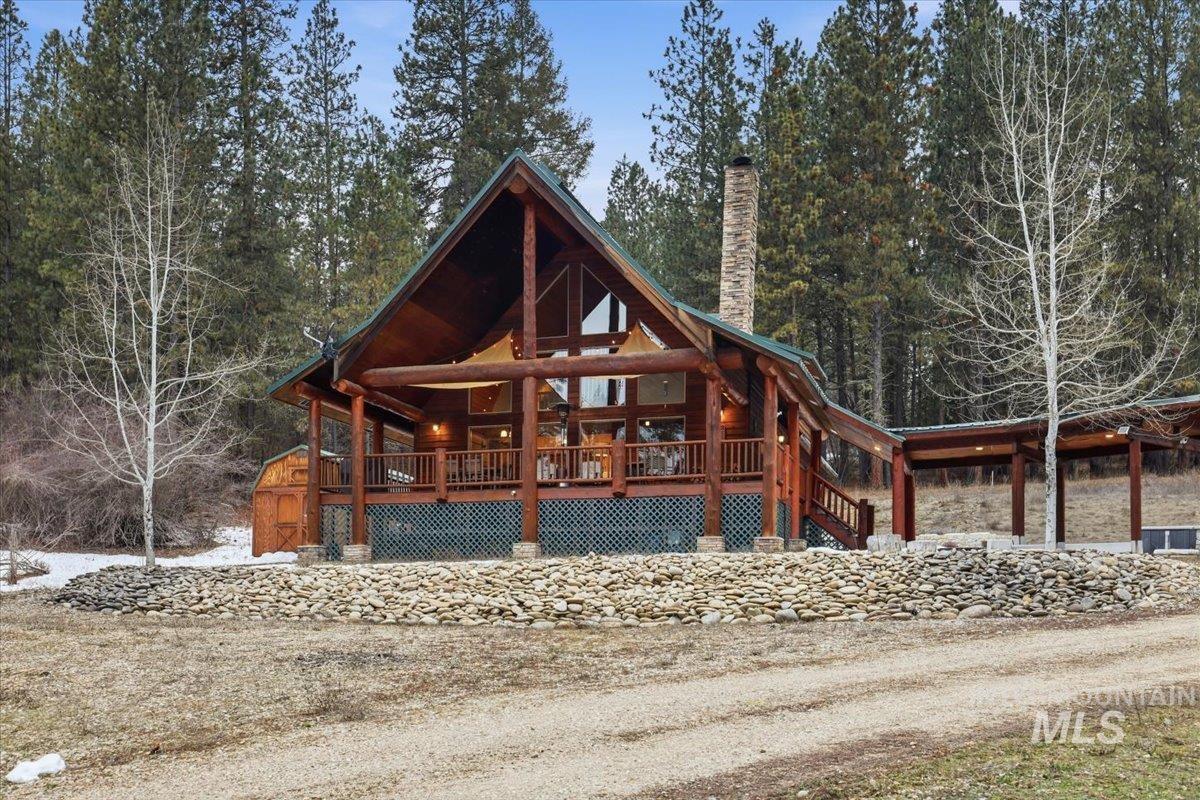 20 Valley High Road Garden Valley, ID 83622 - Photo 1 of 46 View of front facade featuring a deck and a chimney