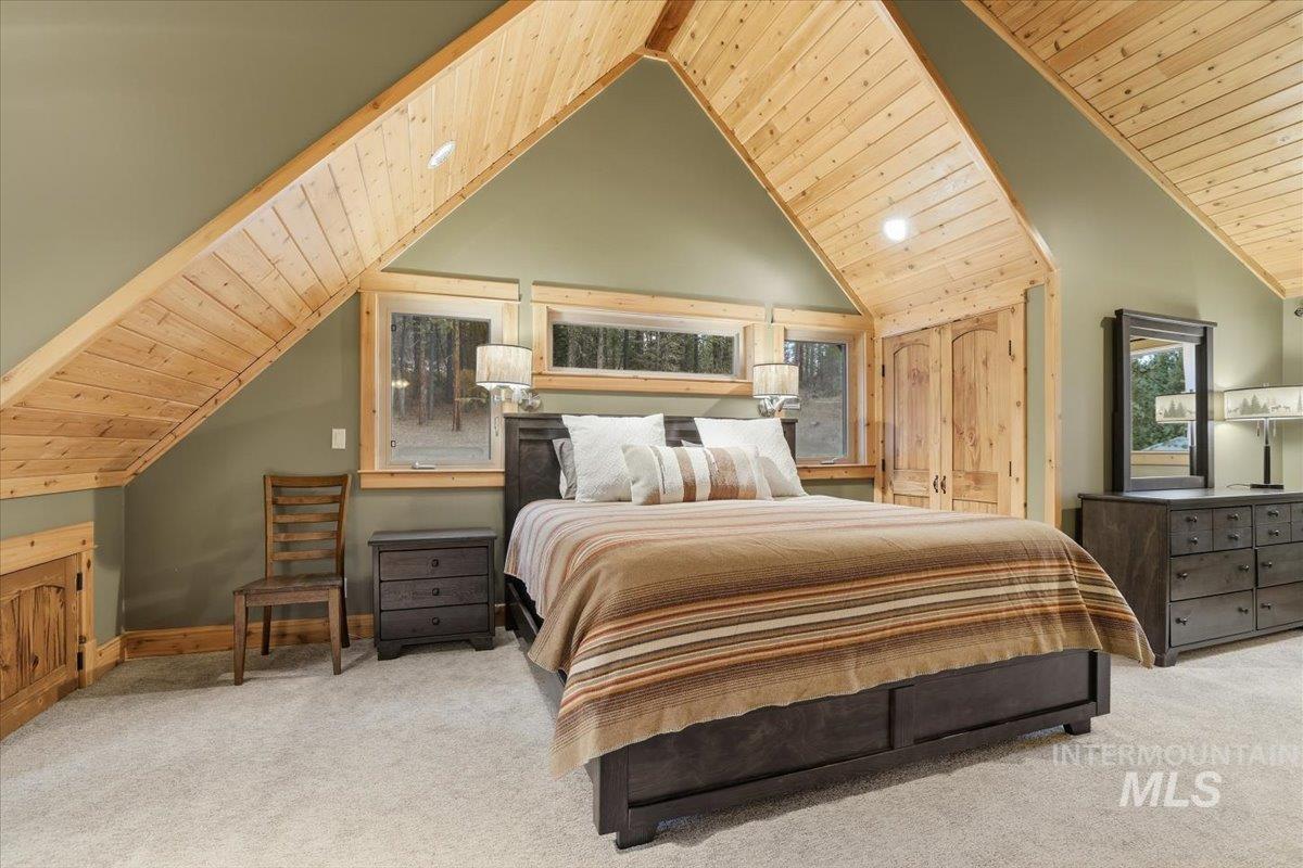 20 Valley High Road Garden Valley, ID 83622 - Photo 22 of 46 Bedroom with wooden ceiling, carpet floors, and recessed lighting