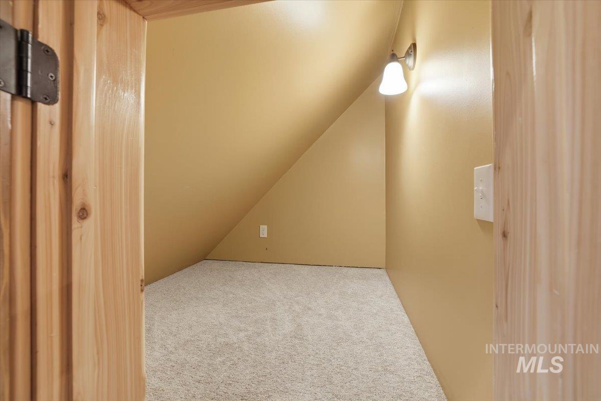 20 Valley High Road Garden Valley, ID 83622 - Photo 26 of 46 Bonus room featuring carpet floors and vaulted ceiling