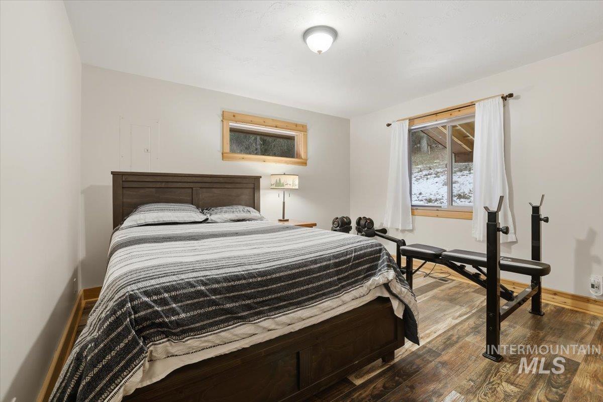 20 Valley High Road Garden Valley, ID 83622 - Photo 27 of 46 Bedroom with wood finished floors and baseboards