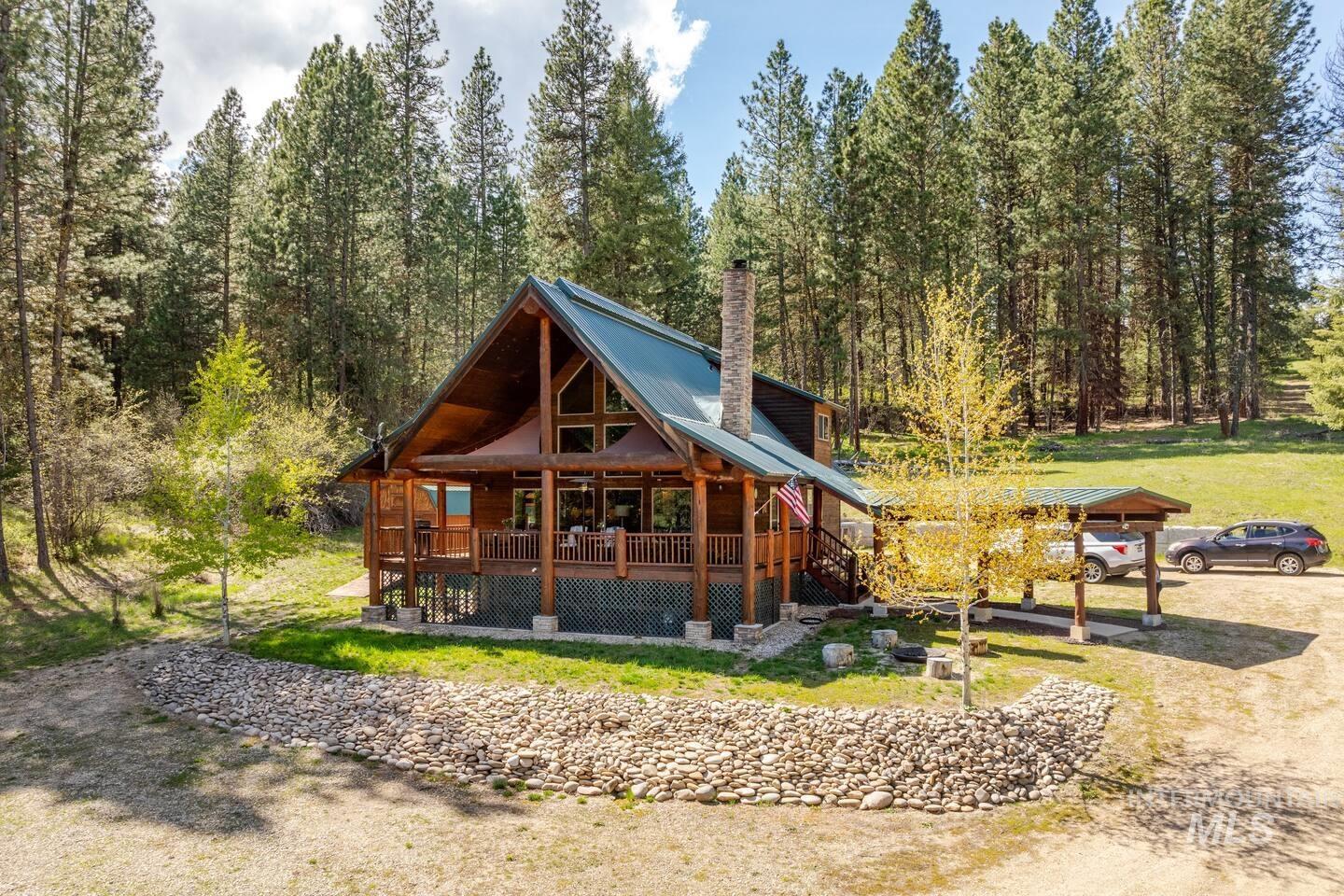 20 Valley High Road Garden Valley, ID 83622 - Photo 44 of 46 View of home's community featuring a deck and a yard
