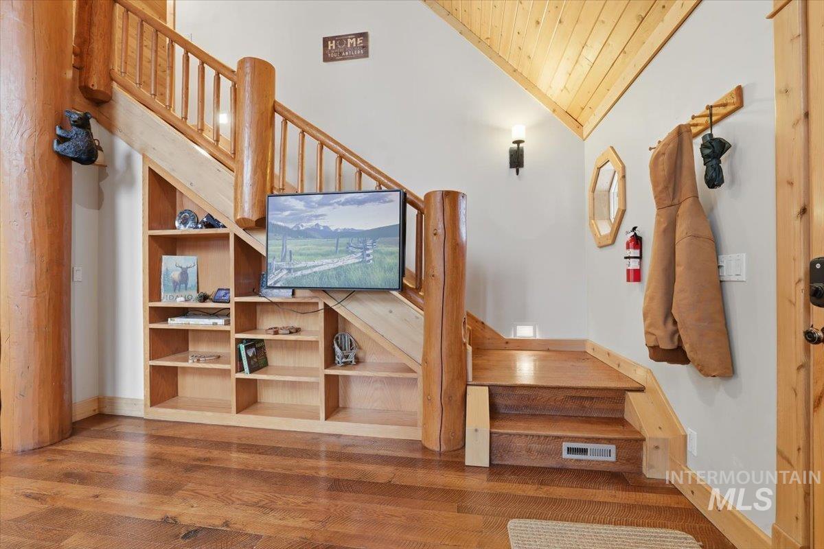 20 Valley High Road Garden Valley, ID 83622 - Photo 6 of 46 Stairs with wood finished floors and wood ceiling