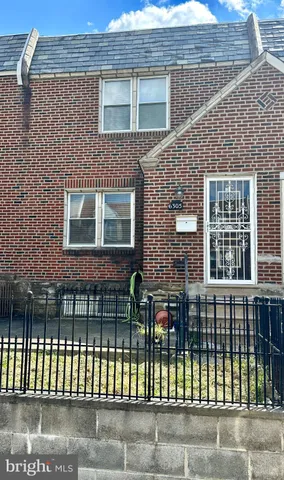 a front view of a house with a porch
