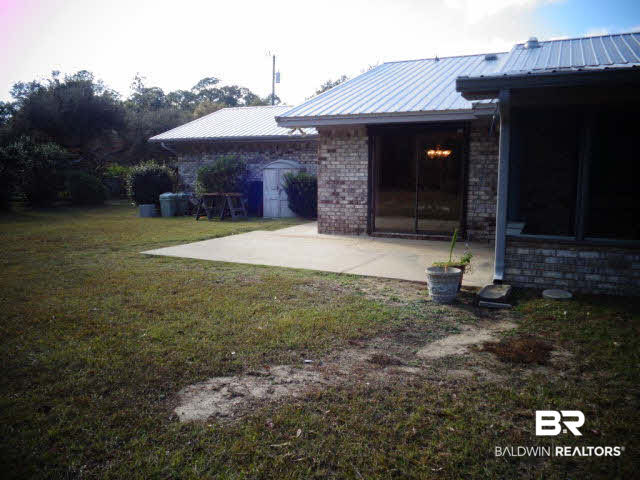 2804 Pine Ridge Drive Lillian, AL 36549 - Photo 33 of 39 18 x 12 open patio off of dining room.