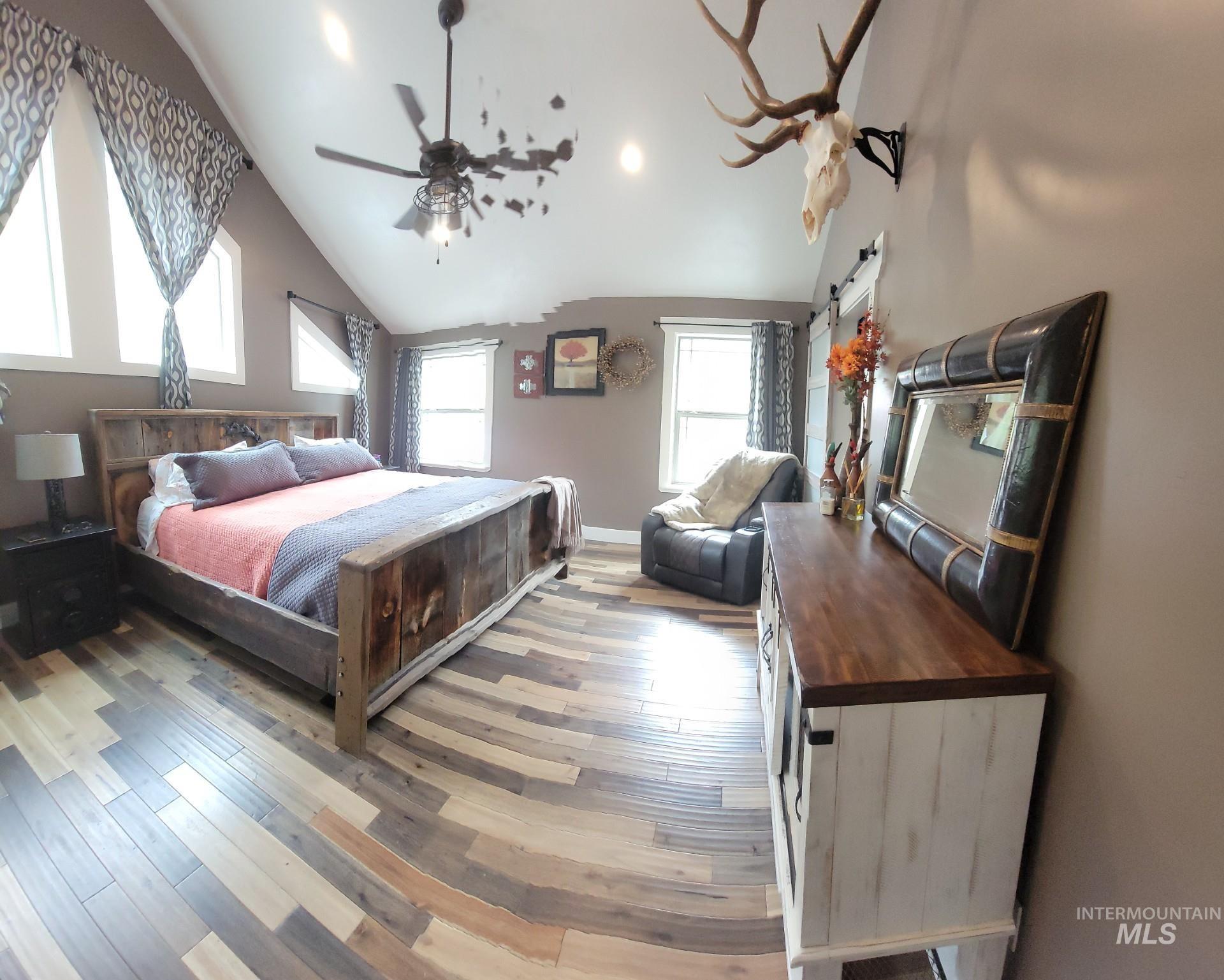 1006 Borah Avenue Riggins, ID 83549 - Photo 14 of 23 Bedroom featuring light wood-style flooring and ceiling fan