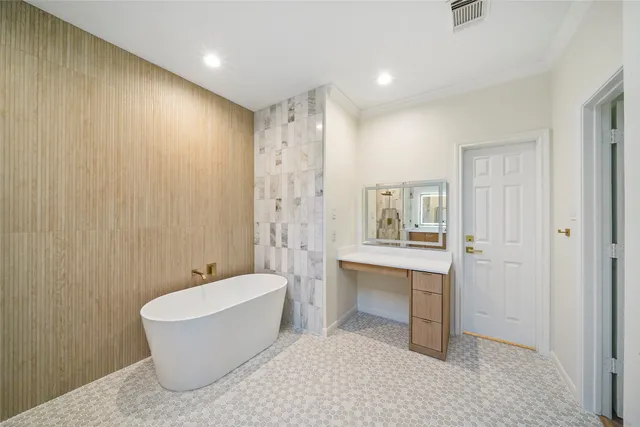a view of a hallway with wooden floor and windows