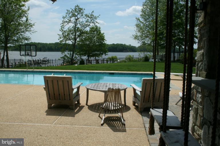4022 Cadle Creek Road Edgewater, MD 21037 - Photo 12 of 27 View from the lower level, htd pool, tiki bar