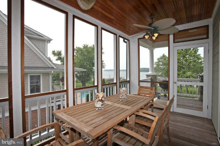 4022 Cadle Creek Road Edgewater, MD 21037 - Photo 25 of 27 Screened Dining area for a Bug Free Environment