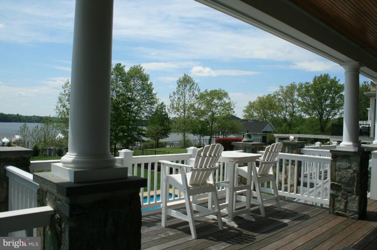 4022 Cadle Creek Road Edgewater, MD 21037 - Photo 8 of 27 Expansive main lvl deck & screen porch