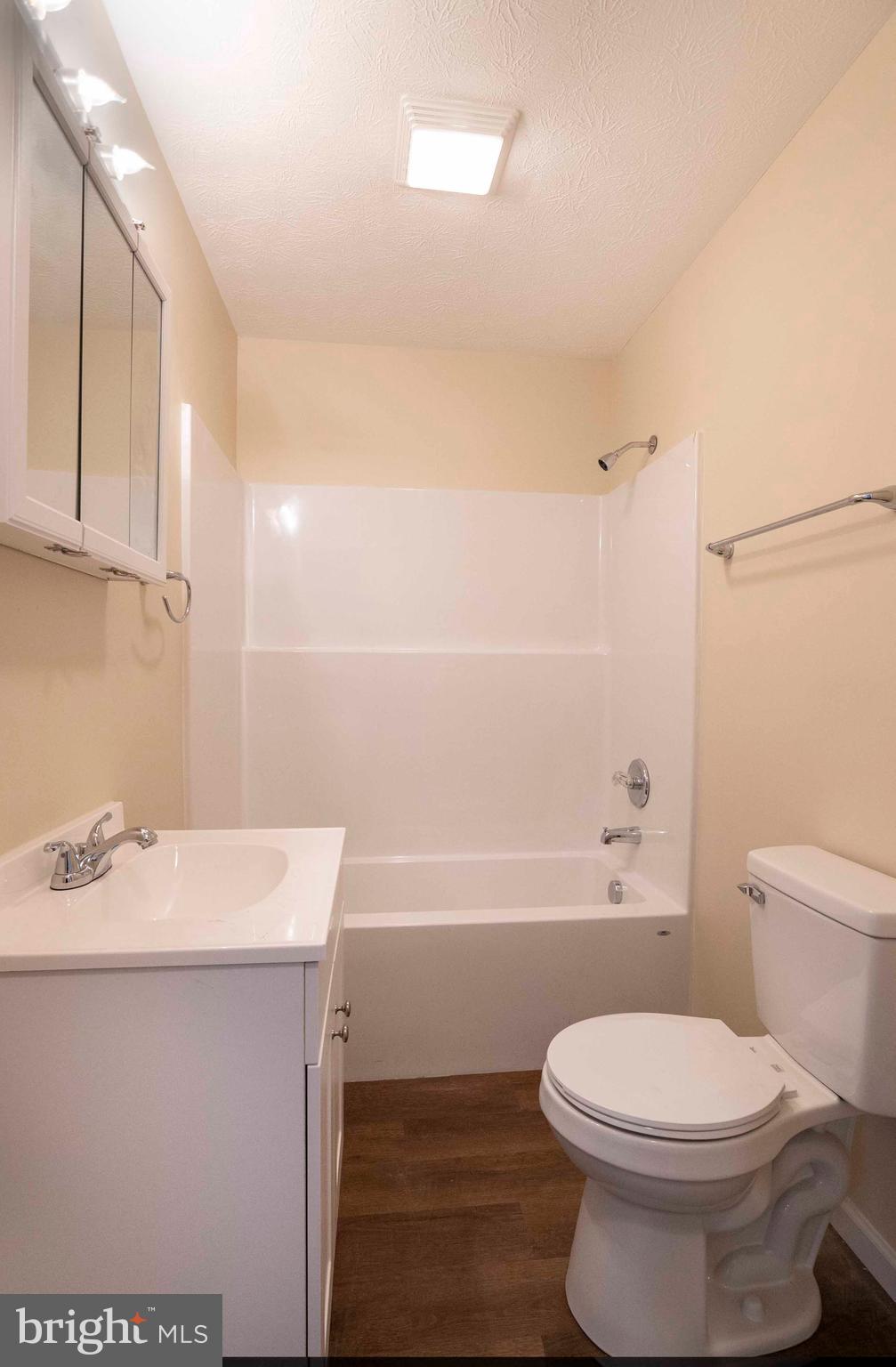 161 Ridge Loop Luray, VA 22835 - Photo 16 of 30 a bathroom with a sink a toilet and bathtub