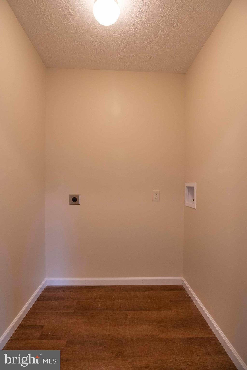 161 Ridge Loop Luray, VA 22835 - Photo 19 of 30 a view of an empty room with wooden floor
