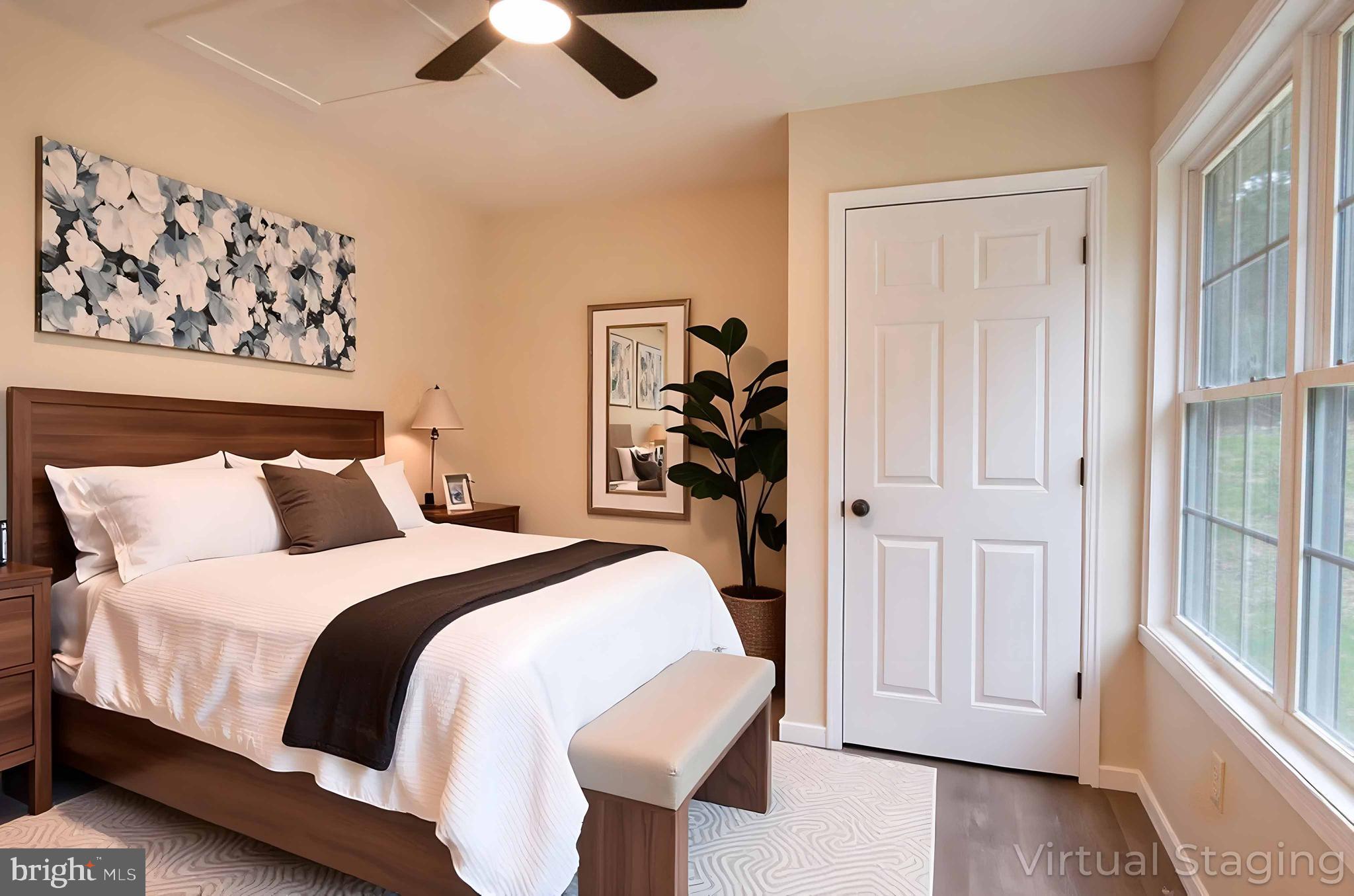 161 Ridge Loop Luray, VA 22835 - Photo 2 of 30 a spacious bedroom with a bed and a chandelier