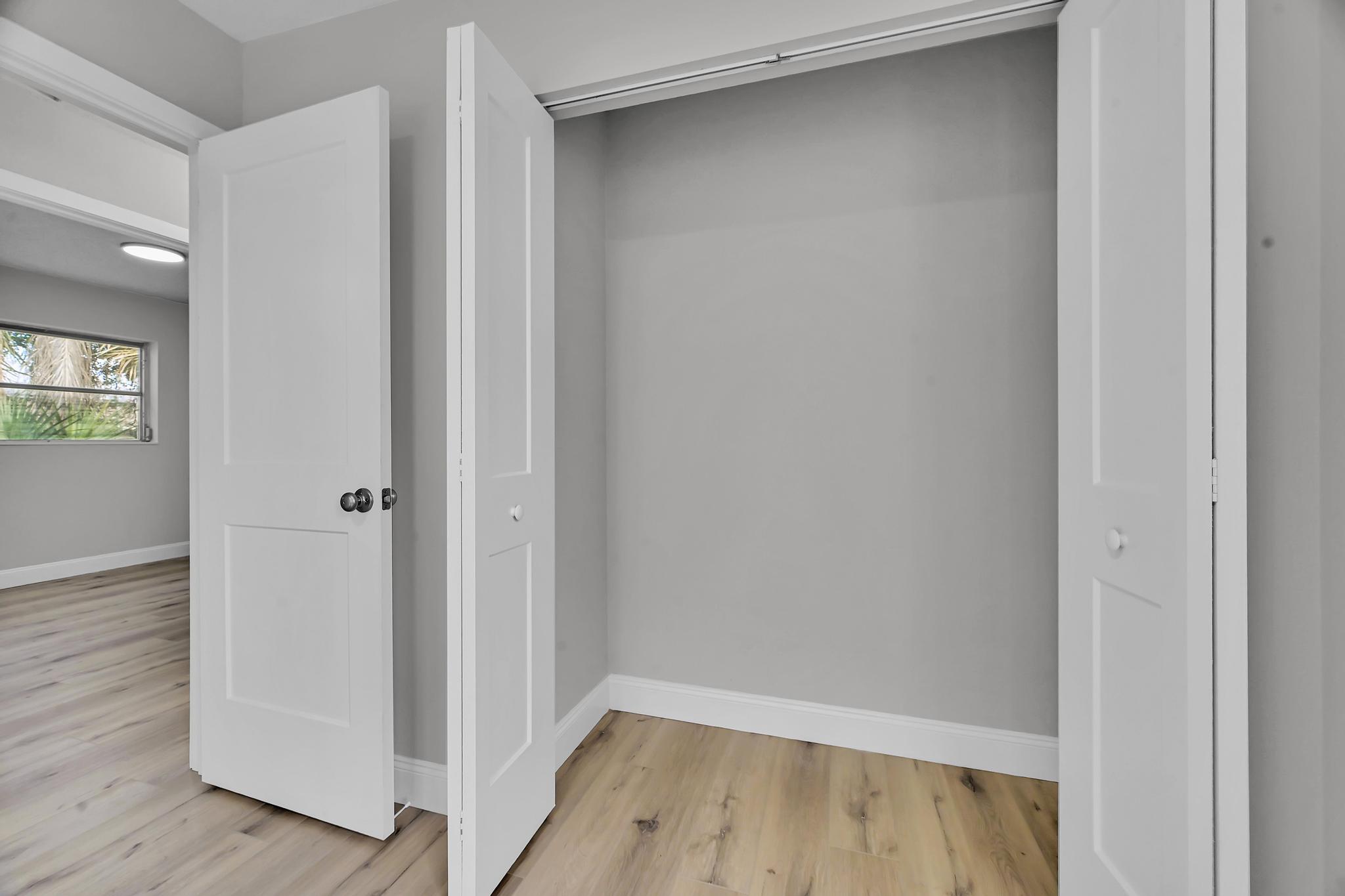 8487 Southeast Begonia Way Hobe Sound, FL 33455 - Photo 19 of 26 a view of small space with wooden floor