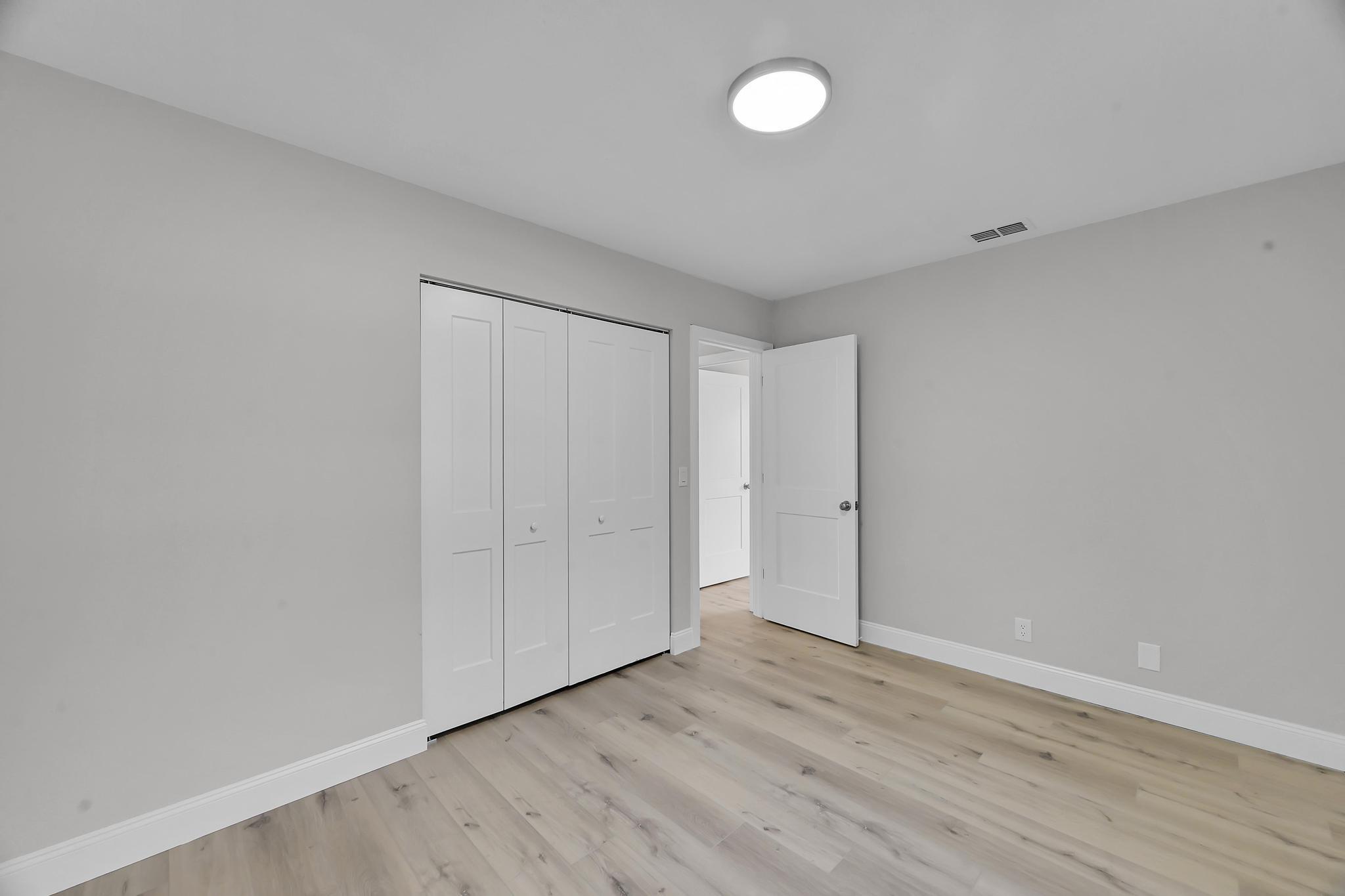 8487 Southeast Begonia Way Hobe Sound, FL 33455 - Photo 21 of 26 a view of an empty room