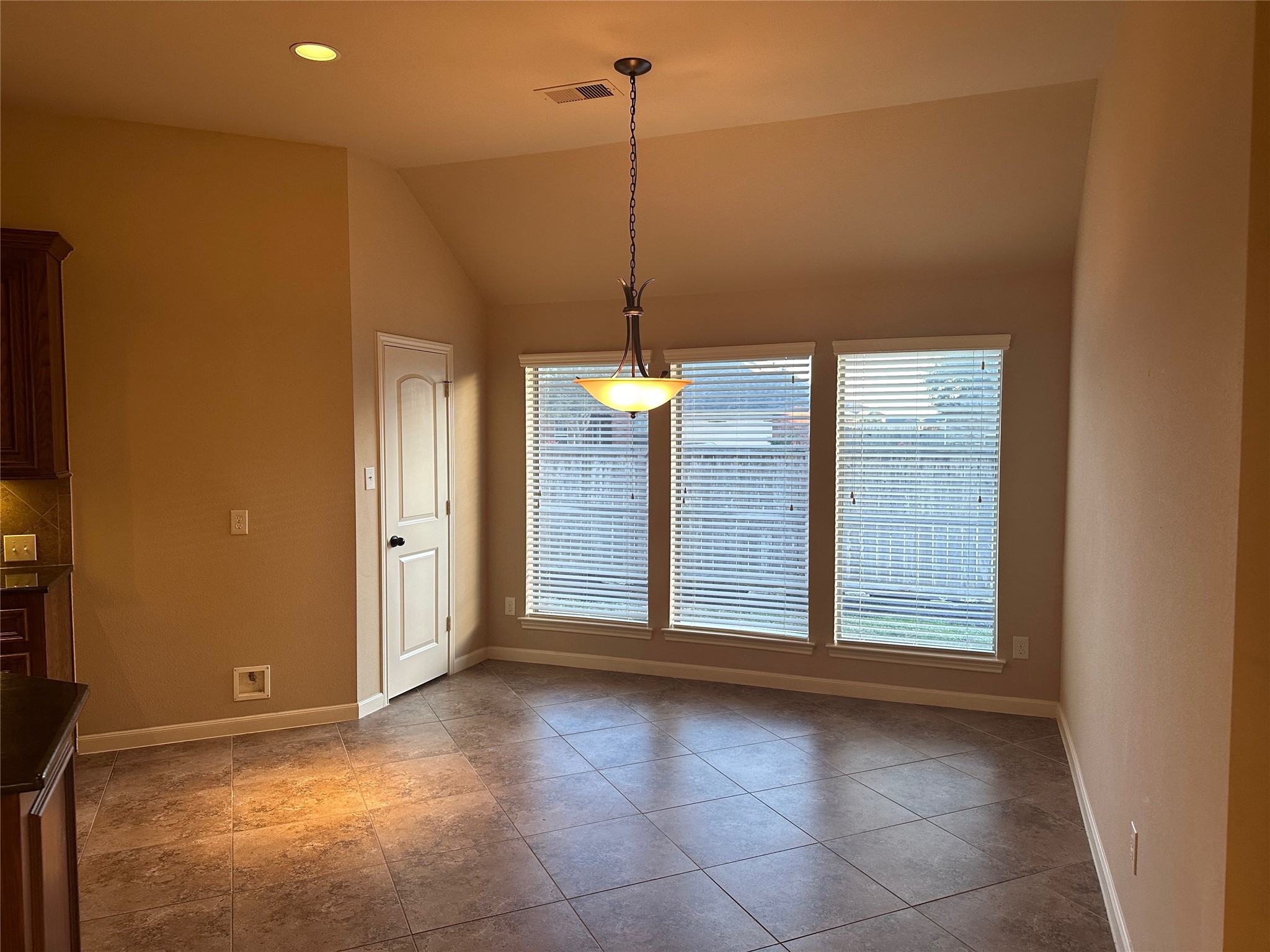 2922 Firewalk Trace Katy, TX 77494 - Photo 14 of 38 a view of a room with a window and chandelier