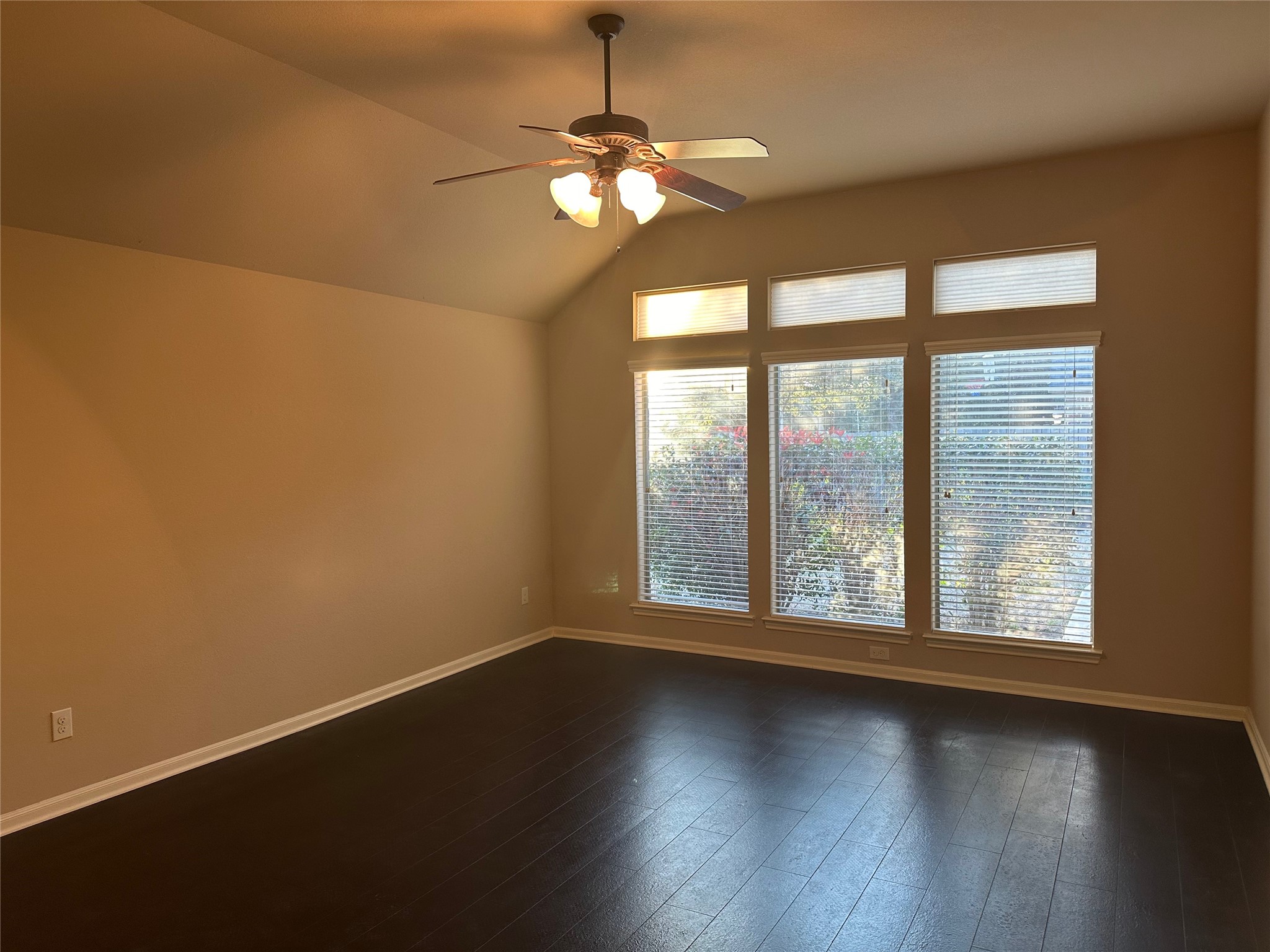 2922 Firewalk Trace Katy, TX 77494 - Photo 20 of 38 an empty room with wooden floor and windows