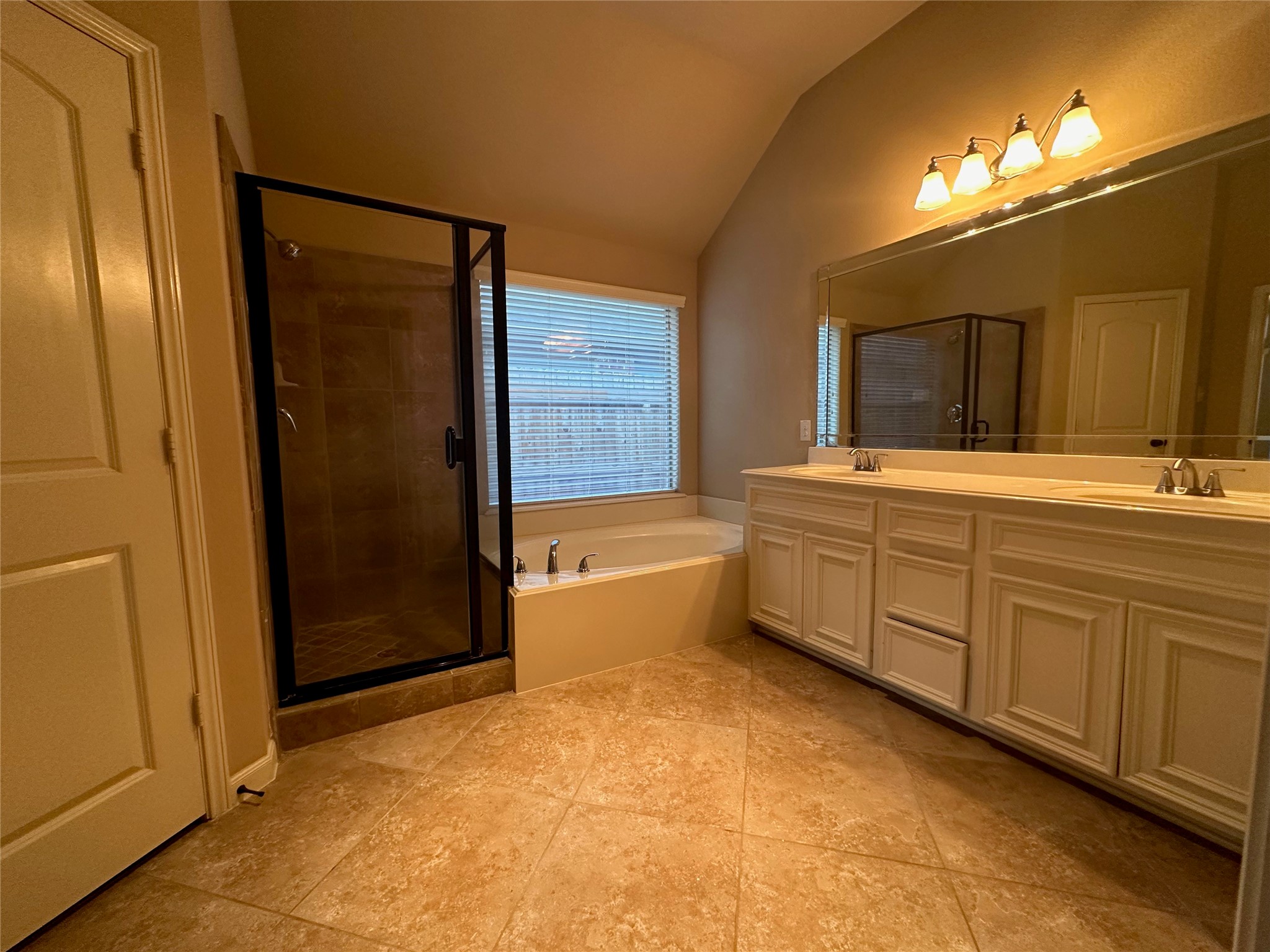 2922 Firewalk Trace Katy, TX 77494 - Photo 23 of 38 a bathroom with a tub sink and mirror