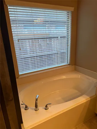 a view of a bathtub in a bathroom
