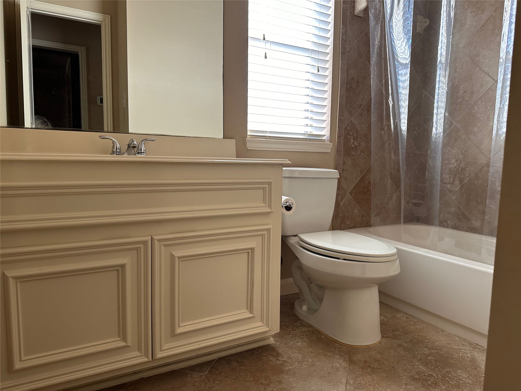 2922 Firewalk Trace Katy, TX 77494 - Photo 29 of 38 a bathroom with a toilet a sink and bathtub