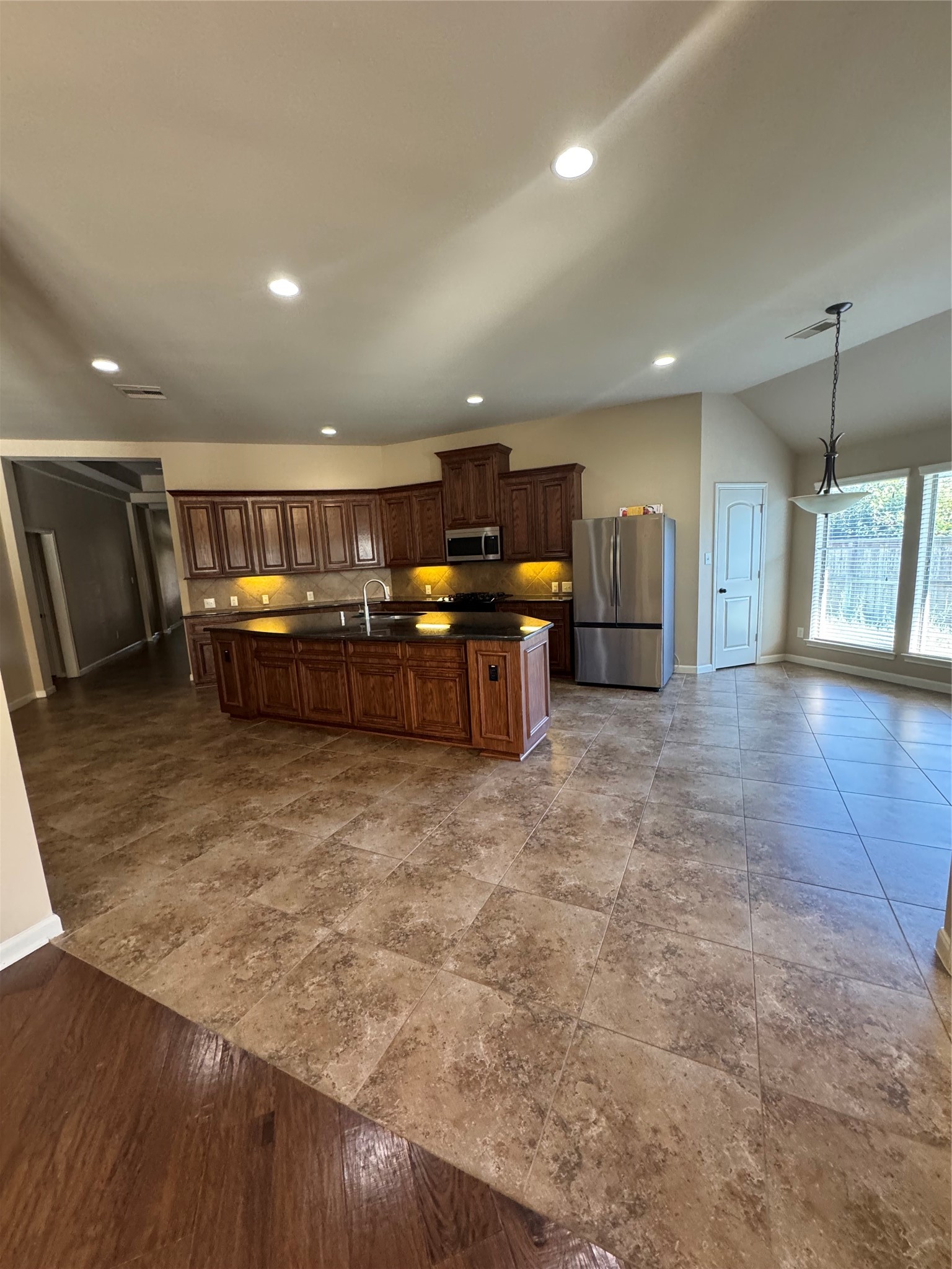 2922 Firewalk Trace Katy, TX 77494 - Photo 10 of 38 a large kitchen with stainless steel appliances a large counter top