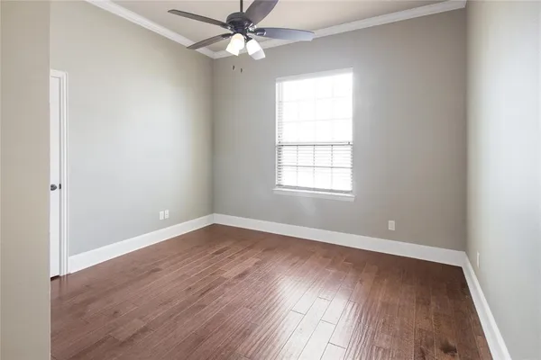 an empty room that has a window in it