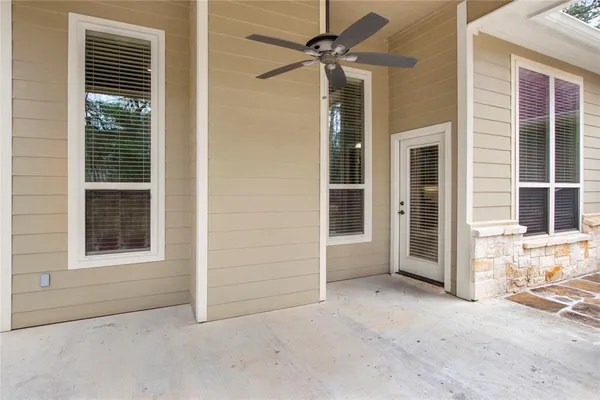 a front view of a house with a yard and porch