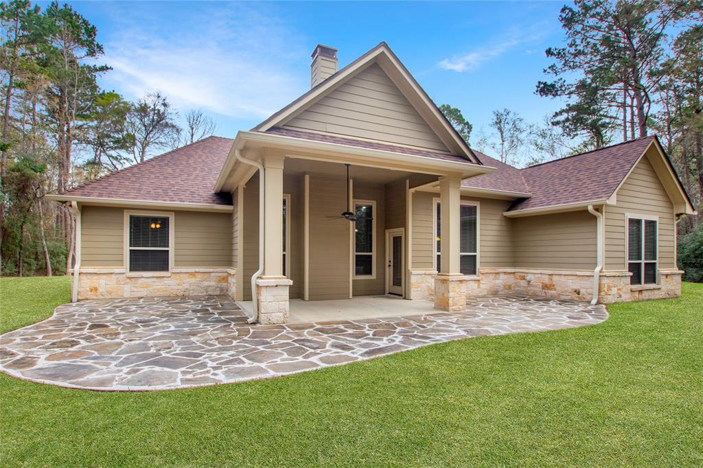 15207 Maple Leaf Court Tyler, TX 75707 - Photo 26 of 29 a front view of a house with a yard and porch