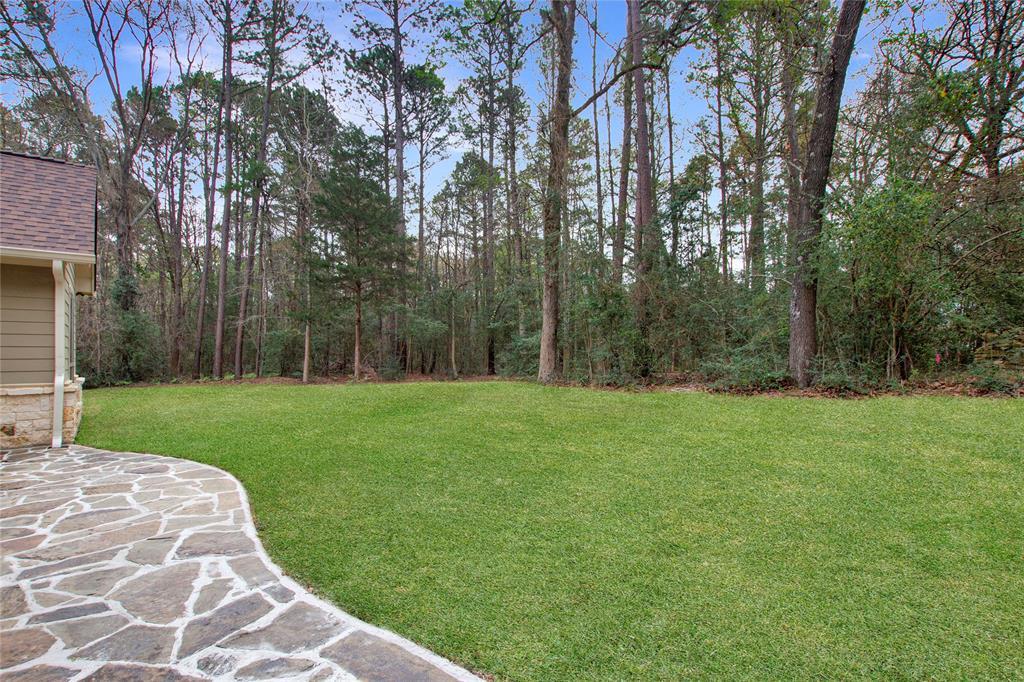 15207 Maple Leaf Court Tyler, TX 75707 - Photo 28 of 29 a view of a backyard with large trees