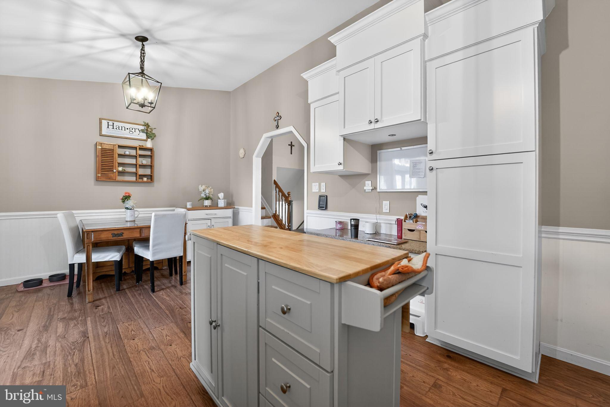7131 Carmae Road Sykesville, MD 21784 - Photo 7 of 17 Charming kitchen with warm wood accents.
