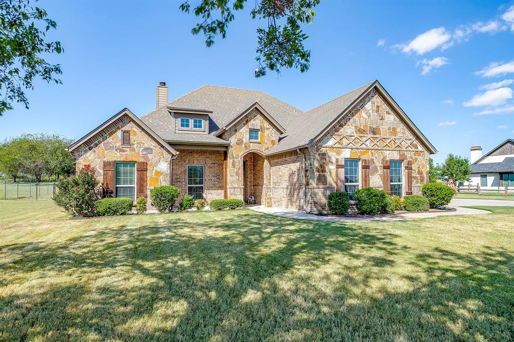 112 Lone Star Way Godley, TX 76044 - Photo 2 of 40 a front view of a house with a yard