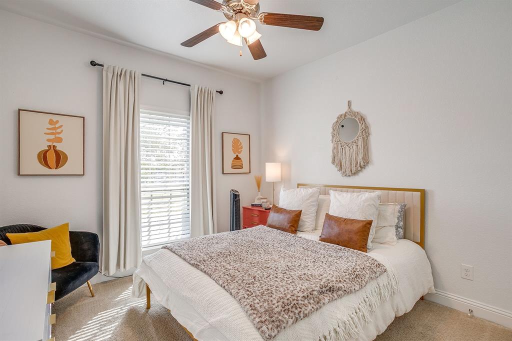 112 Lone Star Way Godley, TX 76044 - Photo 30 of 40 a bedroom with bed and window