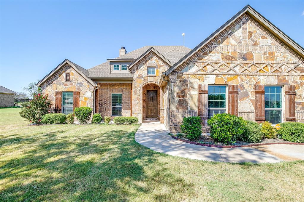 112 Lone Star Way Godley, TX 76044 - Photo 36 of 40 a front view of a house with garden