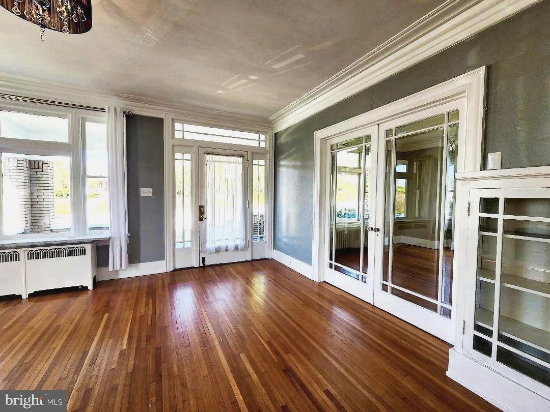515 Fourth Street Shenandoah, VA 22849 - Photo 12 of 69 wooden floor in an empty room with a window