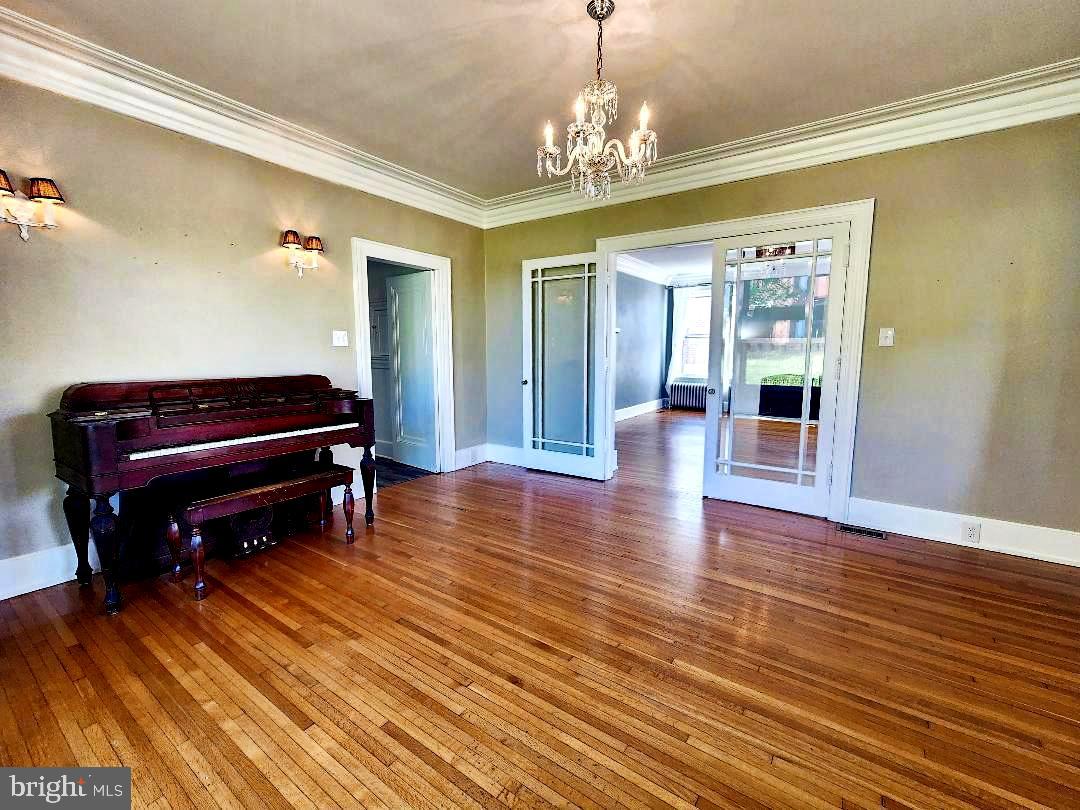 515 Fourth Street Shenandoah, VA 22849 - Photo 18 of 69 a living room with furniture and a chandelier