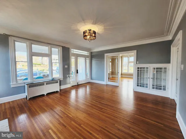 a view of livingroom with furniture wooden floor and window