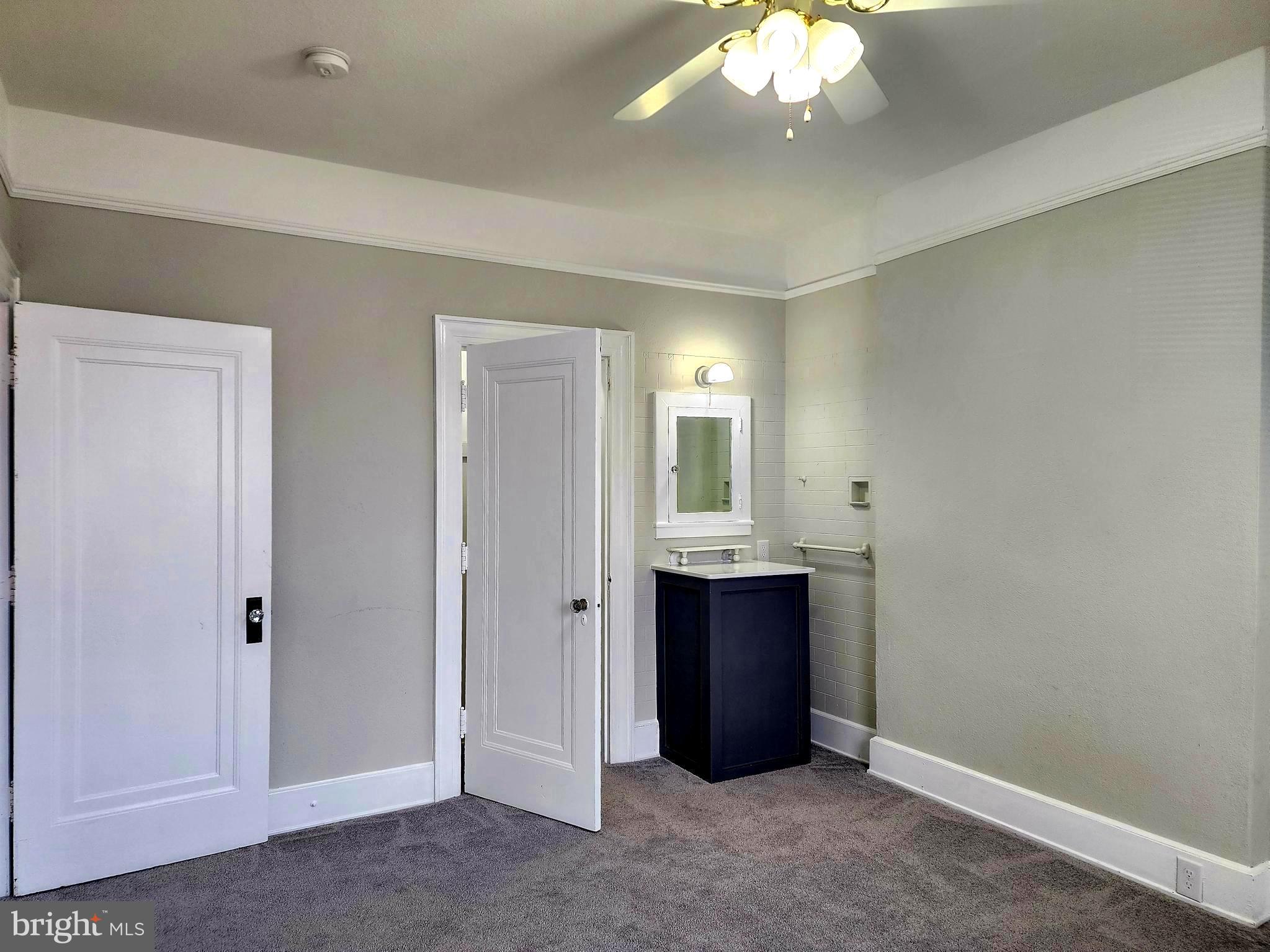 515 Fourth Street Shenandoah, VA 22849 - Photo 54 of 69 a spacious bathroom with a mirror and a shower