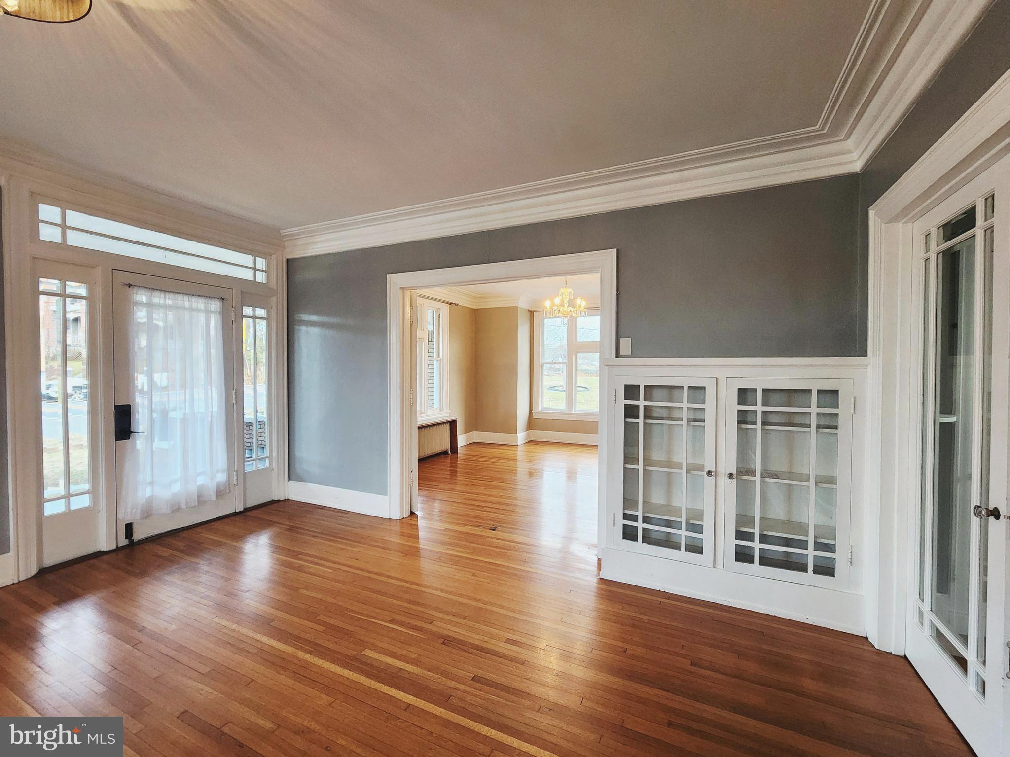 515 Fourth Street Shenandoah, VA 22849 - Photo 8 of 69 an empty room with wooden floor and windows