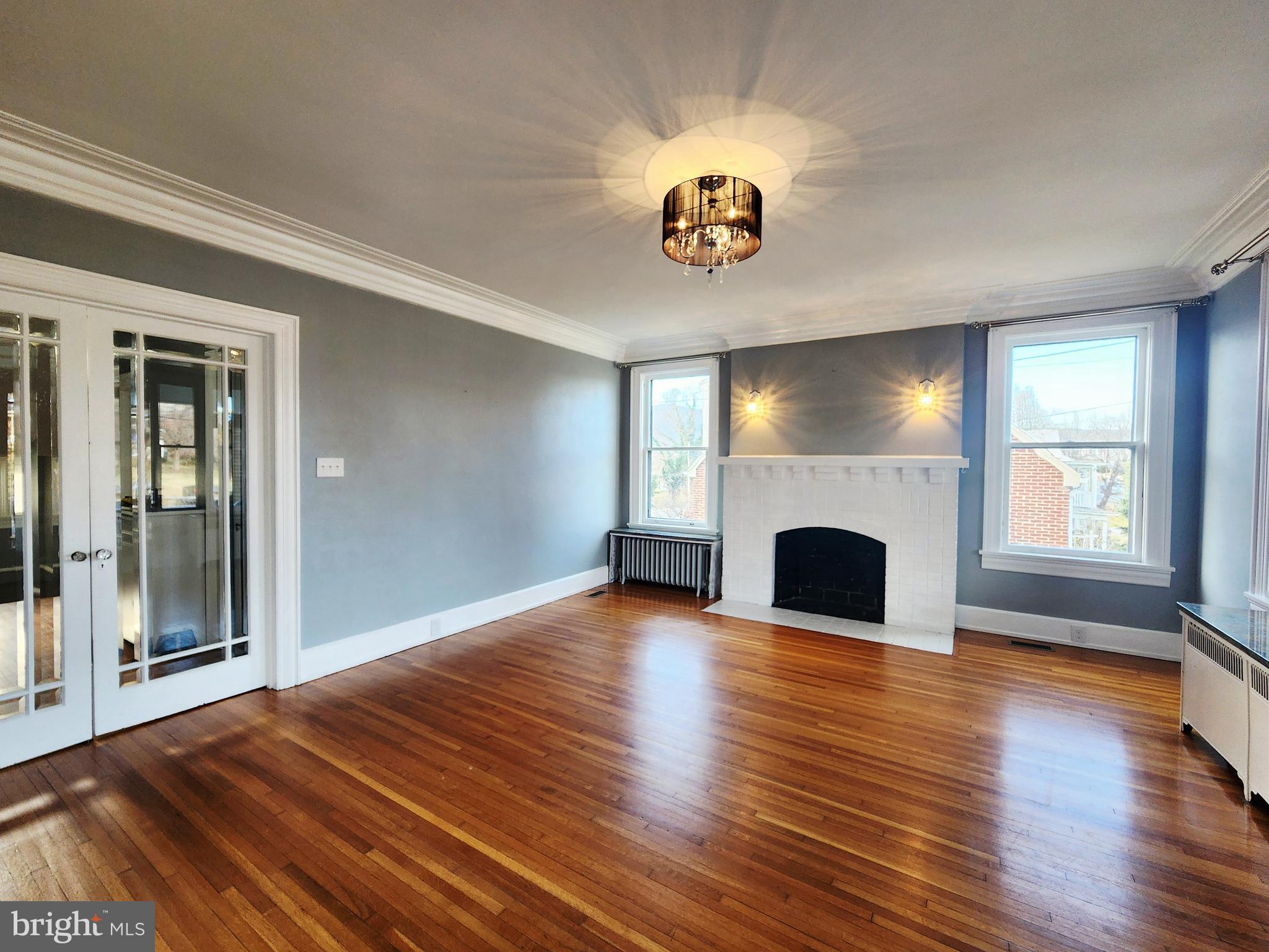 515 Fourth Street Shenandoah, VA 22849 - Photo 10 of 69 a view of an empty room with a fireplace and a window