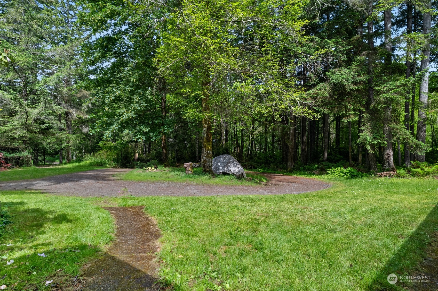 7342 Steamboat Island Road Northwest Olympia, WA 98502 - Photo 33 of 40 a view of a garden with trees