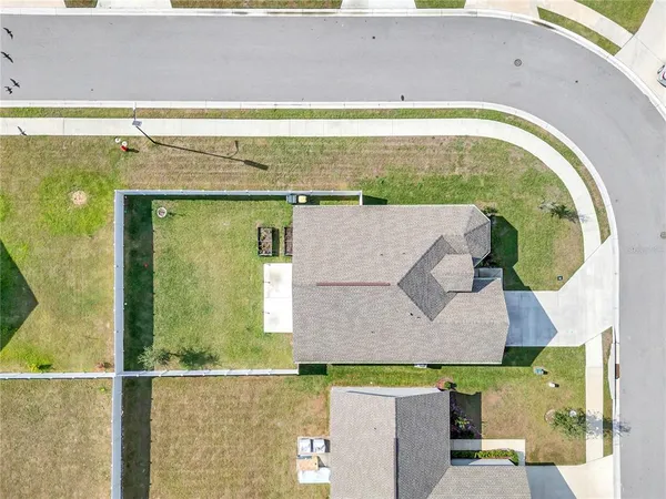 a view of a lake with a yard